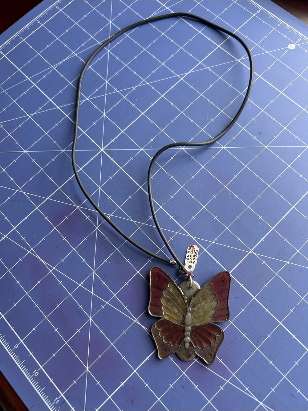 Highly collectible JBK reversable elephant butterfly pendant on leather cord